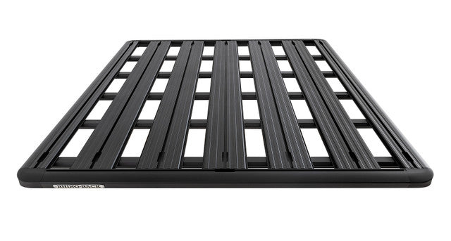 Image of Rhino-Rack roof rack, black aluminum frame with slatted design, angled front and side view on white background