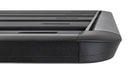 Image of Rhino-Rack roof rack, black aluminum frame with slatted design and rounded corners, close-up side view with smooth edges on white background