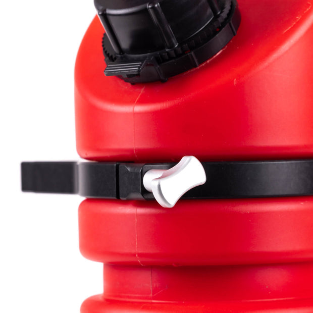Close-up of a red RollPaX container with a black mounting ring and a silver screw, showing the detail of the attachment mechanism.