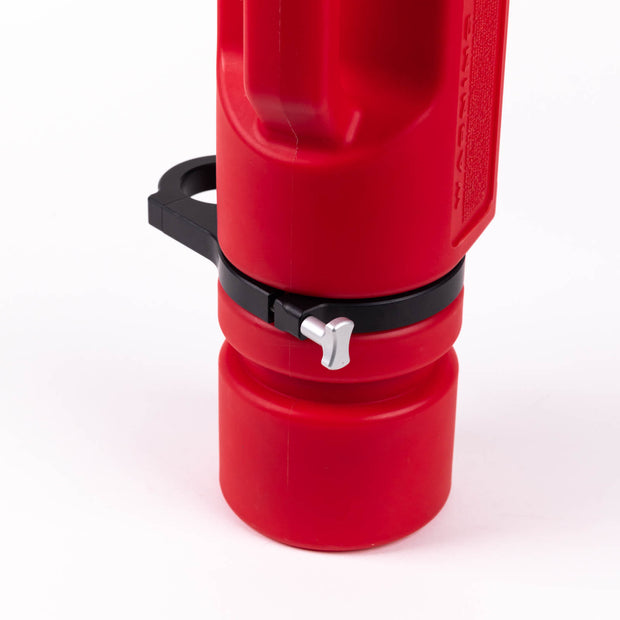 Close-up image of a red Rotopax 1.5-gallon fuel can, secured by a black aluminum mounting clamp with a silver T-handle bolt, on a white background.