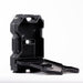 Black RotoPaX fuel can, open with the top part standing upright and the bottom part laid out to the side, angled front and side view on a white background.