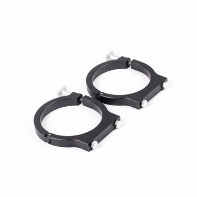 Image of two black powder-coated aluminum mounting clamps, designed with T-handle bolts for easy and secure attachment to off-road vehicle roll cages.