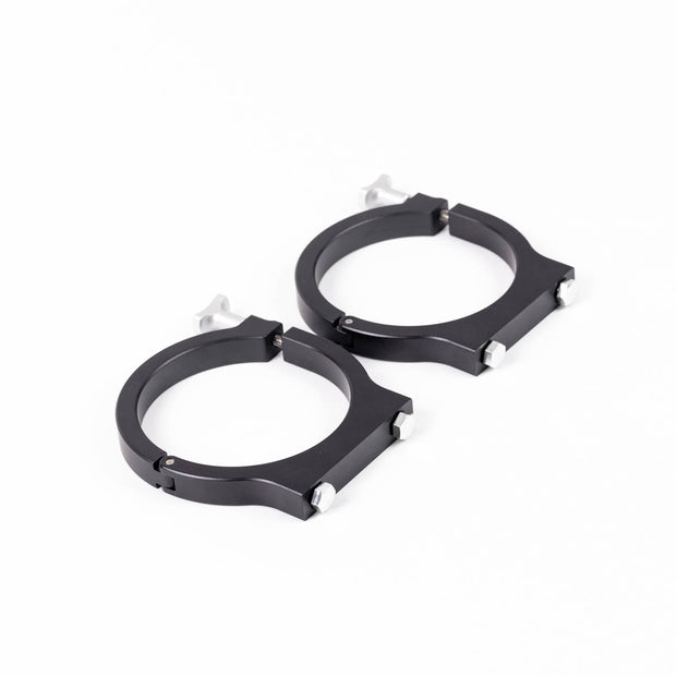 Image of two black powder-coated aluminum mounting clamps, designed with T-handle bolts for easy and secure attachment to off-road vehicle roll cages.