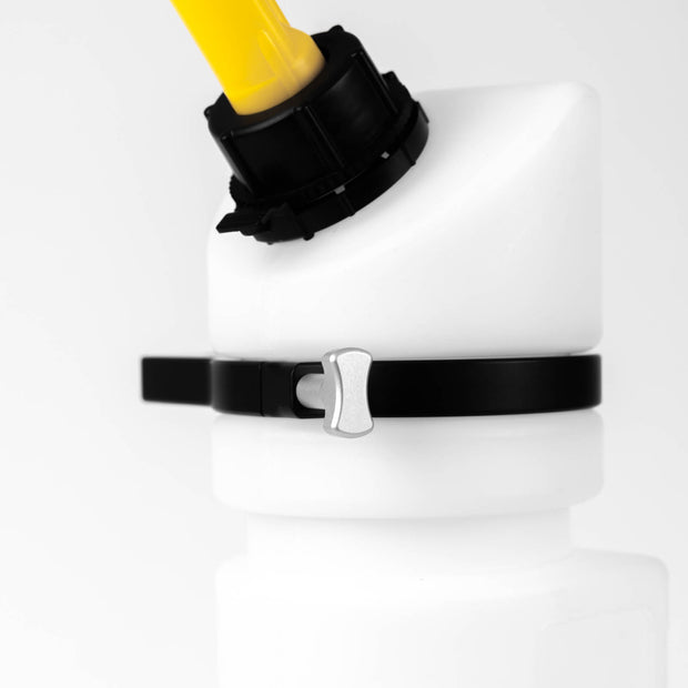 Close-up image of a white Rotopax 1.5-gallon fuel can, featuring a yellow spout and secured by a black mounting clamp with a silver T-handle bolt.