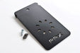 Image of RotopaX black bed rail mount plate with PRX cutout and included bolt hardware, angled top view on white background.