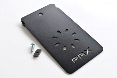 Image of RotopaX black bed rail mount plate with PRX cutout and included bolt hardware, angled top view on white background.