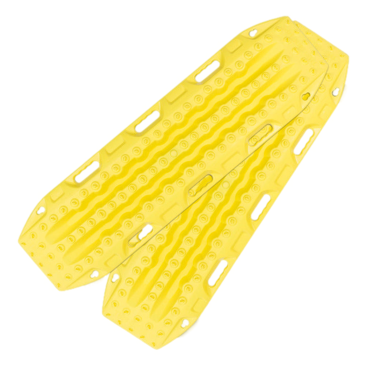Image of two blaze yellow recovery traction boards, side-by-side with textured surfaces and handholds, on a light gray background.