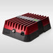 Image of a red and black electronic device, possibly a power inverter or booster, with prominent cooling fins and a green LED indicator light on top, featuring various ports on the front, angled front and side view on a white background