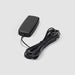 Image of a sleek, black rectangular GPS tracker or antenna with a coiled black cable extending from it, featuring a small red indicator, angled top-down view on a white background