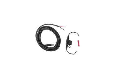 Image of weBoost 12V hardwire power supply kit with coiled black cable, inline fuse, and wiring connectors, angled top view on black background.